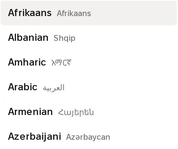 The open language list on the volunteer page: Afrikaans, Albanian Shqip, Amharic, Arabic, Armenian, Azerbaijani, each with its name in its own script beside the English one